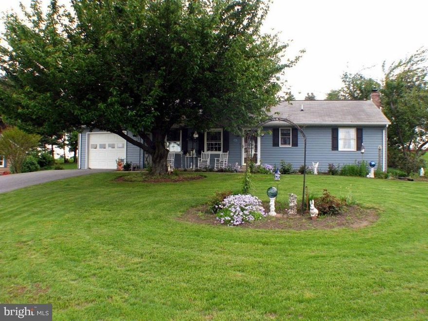 Nice ranch home on .54 acre. Lovely yard to enjoy from sunroom. 2 bedroooms, 1.5 baths, fireplace in living room. Appliances included. Partially  finished LL, chimney hookup available for woodstove.