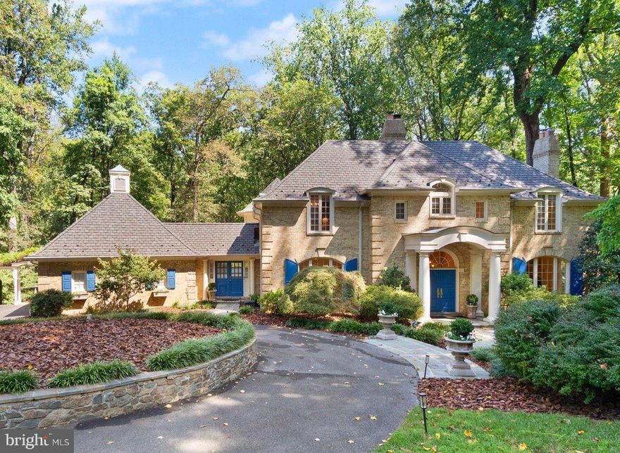 Fantastic New Price! Tucked away on a desirable cul-de-sac with expansive lots, this exceptional residence offers the rare combination of privacy and convenience in a prime Bethesda location. This 5 bedroom home, sited on over 2 acres, is surrounded by lush wooded views, creating a serene natural backdrop from every window.

Inside, the home boasts a thoughtful layout designed for both everyday living and entertaining. The main level features a formal living room, elegant dining room, a double family room with bar, and a gourmet kitchen with a sunlit breakfast area. Step outside to a spacious deck overlooking the peaceful forest beyond. Additional highlights include a large mudroom, laundry room, and a two-car garage.

Upstairs, find four generously sized bedrooms and three full bathrooms, including an owner’s suite with with two offices and ample closet space. The finished lower level provides flexible space with a family room, gym, guest suite with full bath, powder room, and abundant storage.

With its expansive lot, tranquil setting, and spacious interiors, 9017 Clewerewall Drive offers a unique opportunity to enjoy both nature and convenience just moments from Bethesda, Potomac Village and 495.