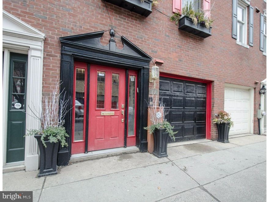 Spacious & Elegant 4 story townhouse in Rittenhouse, built by Kostas Macos.  Enter into a 30 ft. marble entry, garage, coat closet and mechanical/storage room. Entry level offers French doors to a gracious library with a wall of storage, extensive custom cabinetry and French doors opening out to a spectacular customized container garden with Trex fencing, a Rain Bird watering system and custom tiled floor. Gorgeous sun filled 2nd floor for entertaining; living room w/ 10 ft. ceilings, fireplace flanked by French doors to a smaller deck , custom 12? dentil molding throughout, Open Dining Room, Eat-in custom kitchen with south facing windows brings in an abundant about of sunlight. Kitchen equipped w/a 6 burner Wolf dual fuel, convection, 48? professional range, Wolf range hood, Sub-Zero, Wolf Micro, Fisher & Playkel dishwasher, custom sink by Julian, custom cabinetry, Calcutta marble countertops & back splash, Swarovksy crystal light fixtures. 3rd & 4TH floor make up of 4 bedrooms and 3 baths. 3rd fl., rear bedroom suite has 8 feet of closets, white marble bath,  and walk-in closet, front 2nd bedroom, marble hall bath and linen closet. 4th fl., rear MBR Suite w/ 16 ft. of wall closets + outfitted walk-in closet, Travertine spa bath with shower stall, whirlpool tub, double sinks. Front bedroom has a laundry closet w/ LG front loaders and a wet bar for roof deck. Large deck with access to electric & water has 360 degree unobstructed views of the city and skyline.   Location!  Location!  Location!