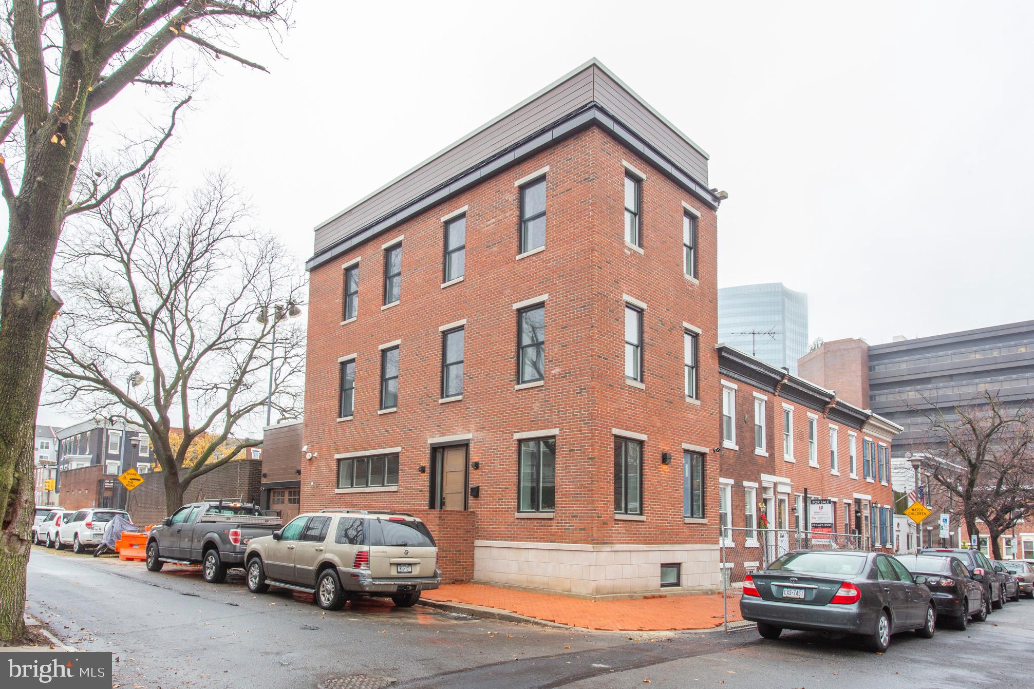 Rare opportunity to purchase this TOTAL RENOVATION (like New Construction!) in highly sought after FITLER SQUARE with GARAGE AND 10 YEAR TAX ABATEMENT (applied for)! Situated on the corner of beautiful Naudain Street, steps from the award winning Schuyklill River Park/Trail, this 4bed/3bath, 3000sq.ft. property is flooded with light and has everything the discerning buyer is looking for. This magnificent corner property features an entrance off of 26th Street designed to maximize the living space and leave you with a large living room and oversized kitchen. High end finishes throughout including a Viking kitchen appliance package, wide plank hardwood flooring, stone countertops and custom cabinets. The second floor master suite is oversized with a huge walk in closet, large bath with separate his and her sinks, enormous shower, floating tub and massive private terrace. Third floor has two additional bedrooms, hall bath and large laundry room! Full size roof deck with panoramic views of center city! Full, finished basement with secondary living space, fourth bedroom and full bath. 10 year tax abatement applied for! Buy now and Buyer can select some interior finishes! Located close to Fitler Square, Rittenhouse Square, Schuyklill River Park, UPenn and the walkability is off the charts! If you don t like walking that is okay too because parking is a breeze when you have GARAGE PARKING!