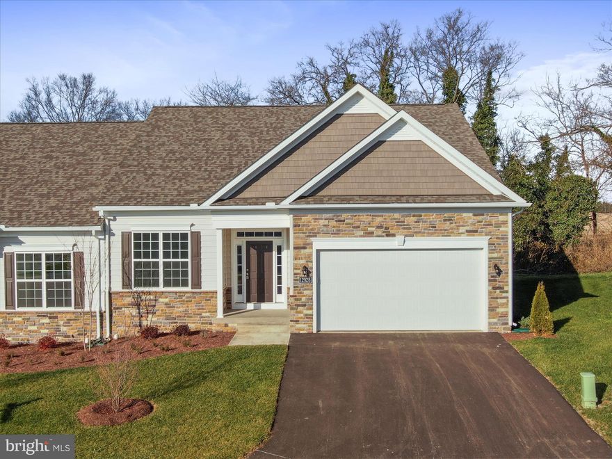 Beautiful New construction completed and will be ready for occupancy October 1st. This wonderful light and bright villa features three bedrooms and three full baths.  Master bedroom and bath with walk in closet located on the main level with an additional bedroom and bath. Open concept living room and kitchen area with granite counters making it easy to entertain and not miss a thing with your guests. Come tour this Manor House Builders villa to you see for yourself all that it has to offer. You won't be disappointed! Located close to shopping, medical and commuter routes.
Photos are from a similar previously built home.