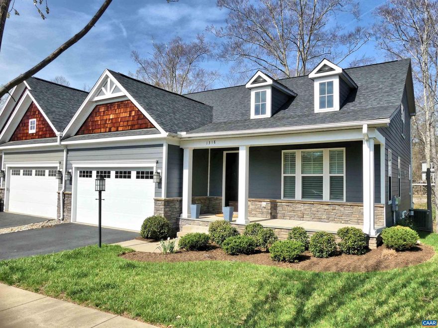 RARE OFFERING in the Villas at Belvedere!  This spacious 2,846 square foot home gives you one level living in luxury.  Gorgeous engineered hardwood floors are throughout your main living area which offers a wide open Living room / Kitchen / Dining area concept.  You will enjoy the relaxed Living room area with a gas fireplace centerpiece and TV and mounting brackets, all included.  In the Kitchen, your gourmet workspace has an abundance of cabinets, double wall ovens, and an oversized quartz countertop island.  Completing the main level is your 16 x 15 Primary bedroom and full bath with a spacious ceramic tiled shower.  9 foot ceilings all around create a wonderful open and expansive atmosphere.  Are guests coming over for the night?  Well, upstairs they will love the BIG loft area and a second full bedroom/bath suite.  A third bedroom also is just off a full hall bath.  Need storage area?  Get ready for the HUGE full unfinished basement which is plumbed for another bath if desired.  This home is in superb condition and is better than new with 2 TV's included (Living room & Primary BR), and high  quality window blinds in place.  Located on a premium conservation lot backing up to woods, this is your address for rest and relaxation,Quartz Counter,Fireplace in Living Room