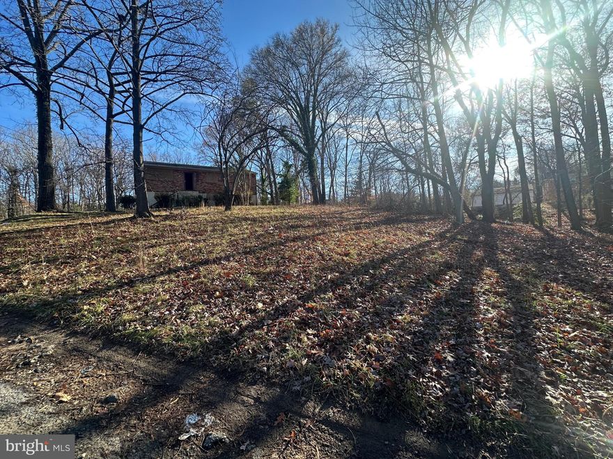 Buyer couldn't perform and back on the market! Investor Special- Hidden driveway leads you to this 20,000 sq ft of private land for those who want the serenity of rural living while still near the city and the major thoroughfares. Zoning is RSF-95 - Can build up to 40 Ft, and an extend back or side to side.  No demo needed - Owner started and did not finish.  Interior is awaiting a builder with a vision to finish bringing it to greatness!