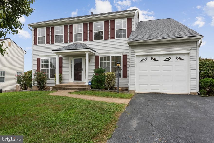 Huge Price adjustment! Super Nice 3 level Colonial Home with lots of updates. New Roof in 2017,  New Carpet and New paint in  in 2019, New Garage door 2017. Gorgeous Hardwood floors main level, 5 Bedrooms 3.5 Bath rooms 4 Bedrooms and 2 baths are in the upper level.  Additional bedroom and bath in the walk-out basement. Formal living and Dining room on the main level. Family room opens to the  Gourmet kitchen with Stainless Steel appliances, granite counters, Microwave and Refrigerator replaced in 2018, Gas Stove in 2017.   Large level backyard, 1 car garage. Close to schools, restaurants and shops at Potomac Mills and main roads.