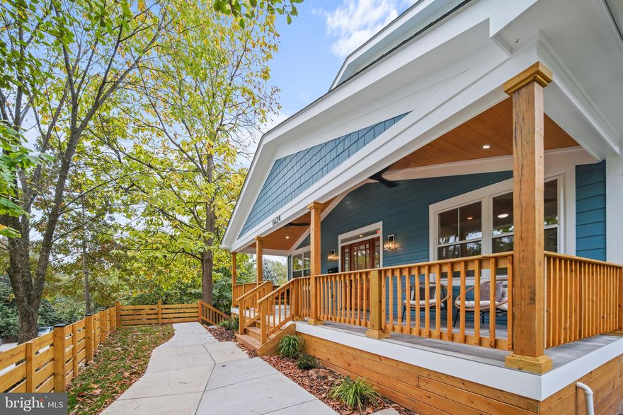 Introducing your dream home in the heart of Takoma Park, where elegance meets sophistication. Crafted by your favorite local Takoma Developer, this masterpiece offers a seamless floor plan with top-tier materials and luxurious attention to detail.

As you step inside, gleaming hardwood floors and abundant natural light welcome you, highlighting the high ceilings and exquisite design. The main level features a versatile bedroom/office with its own ensuite bathroom, a family room with bay windows, and an elegant dining area with a chic light fixture. The family room features bay windows, an abundance of natural light, and opens up to the dining and living room. The living room is a cozy retreat with beautiful inset shelving and a fireplace, leading to a huge deck that overlooks the backyard and three paved parking spots.

Step into the heart of this home, where the gourmet kitchen stands as a testament to style, luxury, and charm. This chef's paradise is designed with intricate features that captivate the senses. Cabinets and quartz countertops elegantly wrap around a massive island, offering seating for four and creating a perfect gathering spot for family and friends.

At the center of this culinary masterpiece is an Italian-imported stove, a true showstopper that promises to elevate your cooking experience and an $8,000 value (Builder had it shipped over)! The walk-in pantry, adorned with stylish shelving and pendant lighting, adds both functionality and flair, ensuring that every culinary need is met with ease.

The kitchen's design is further enhanced by perfectly placed shelves with sconce lighting, creating a harmonious flow throughout the space. The light fixtures seamlessly complement the knobbed sink faucet and the pot filler over the stove, adding a touch of sophistication to the overall aesthetic.

Welcome to the expansive primary suite, a sanctuary of luxury and comfort. This elegant retreat features a generous walk-in closet, complemented by a ceiling fan and recessed lighting that create a serene ambiance. The carefully selected wallpaper and wainscoting design add a touch of sophistication, while glass sliding doors open to a private side rooftop balcony, offering a perfect escape.

The primary bathroom is a modern oasis, boasting a glass walk-in shower with windows that frame the standalone soaking tub, inviting relaxation. An elegant dual-sink vanity seamlessly integrates with the overall design, highlighted by breathtaking tile work that exudes style and grace.

The upper level continues to impress with an additional ensuite bedroom, along with two more spacious bedrooms. Each room is equipped with ceiling fans, recessed lighting, and beautiful hardwood flooring, ensuring comfort and elegance. A hallway full bath with a tub completes this level, providing convenience and luxury for family and guests alike. The huge open basement features high ceilings, recessed lighting, a wet bar with Quartz countertops, a wine fridge, and a large bedroom with egress windows and two walkout access' to the covered brick patio and to the side of the home.  Utility room has plenty of space for storage, and around the back is an oversized attached storage shed. 

This extraordinary home is perfectly situated near historic Takoma Main Street, the Takoma Metro, and a plethora of shops and restaurants. Enjoy short commute times to Washington DC with easy access to highways and major roadways, making this location unbeatable.

With 4,300 sqft, 6 bedrooms, and 6 bathrooms, this home is not just a residence; it's a lifestyle. Don't miss the opportunity to make it yours. Contact us today for more details and experience the pinnacle of luxury living in Takoma Park.