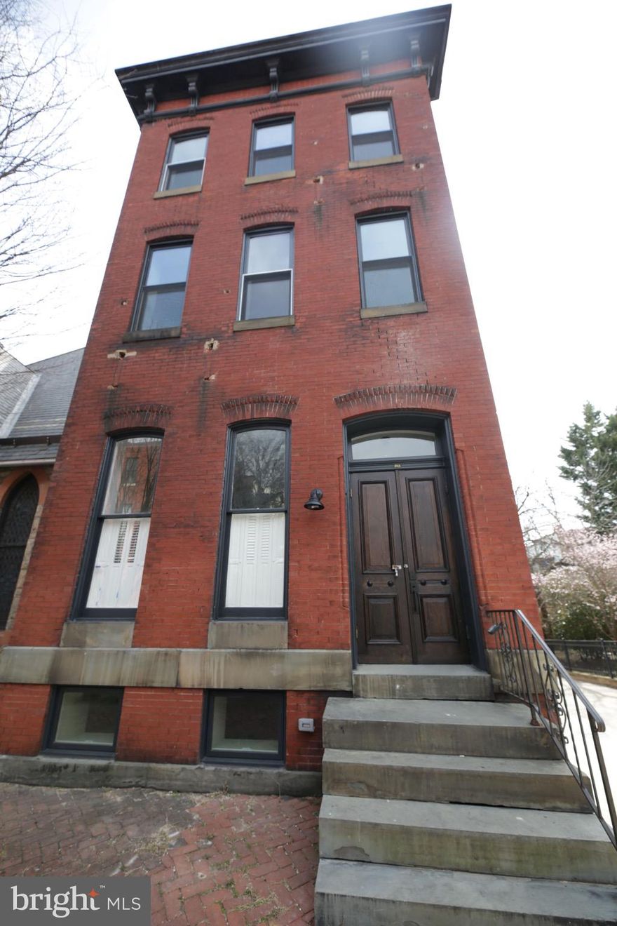 Masterfully renovated Bolton Hill three-level 4bd/4.5ba with new everything! There is approximately 3800 square feet of sheer magic for this gem of a home! Gorgeous hardwood flooring throughout the main living space and bedrooms. Tall windows and designer recessed lighting allows for a beautifully lit space. Living room adorned with tall windows, brick fireplace fascade and large closet. Be amazed by the kitchen with stainless steel appliances, custom cabinetry, soft-close drawers, marble countertops and a brick fireplace fascade behind oven. Tons of cabinet and counter space and a breakfast bar! Dishwasher for ease! Half bath with marble top vanity on the first floor. Three levels of living with two bedrooms on middle floor and two bedrooms on the top floor. Each spacious bedroom has it's own master bath and walk-in closet. Porcelain tile, tile floor, marble top vanities and tile surround featured in each of these full bathrooms.  Washer/dryer on second floor. Central a/c. Ample street parking. Closet space galore with hallway closets throughout. Utilities not included in rent.