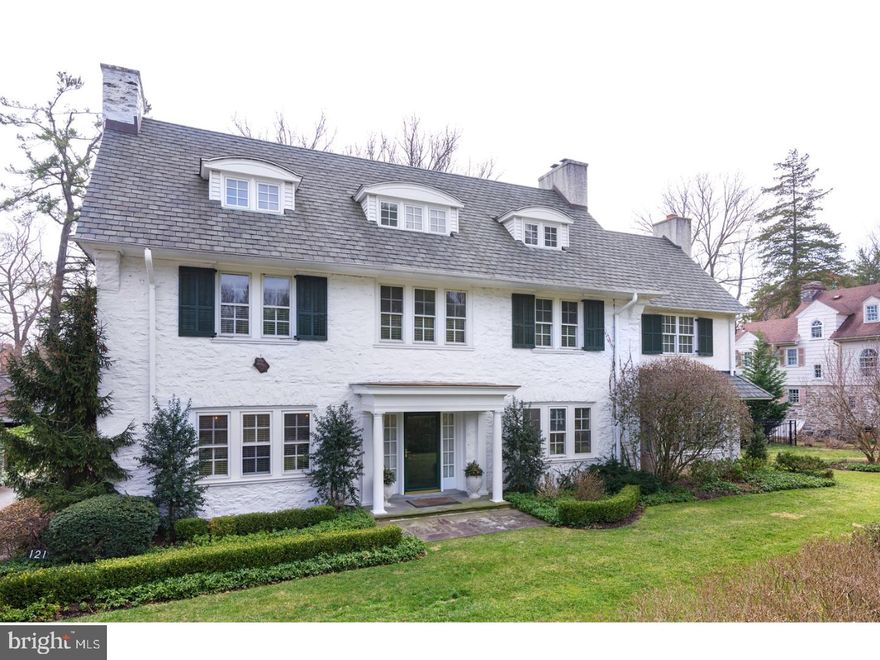 Gracious, bright & architecturally balanced painted stone colonial home on idyllic lot in a most coveted Haverford location offers 5 spacious bedrms, 4 full & one 1/2 bath, & a superior level of detail which only homes of this era can provide. Four handsome wood burning fireplaces located on two  flrs provide warmth & charm while deep sills & an abundance of windows flood the 3 finished floors in natural light. Classic Center Foyer highlighted by a traditional turned stair opens through a wide cased opening to the formal L/R highlighted w/gleaming hardwood floors, crown & base board molding & f/p. Two sets of French doors lead the eye from this formal area to a large F/R with a centrally focused fireplace surrounded by paneled millwork & custom shelving. Expanding on this social space find a charming screened, three season porch which connects to a wide blue stone walled outdoor terrace spanning the length of the back of the home, making it ideal for effortless al fresco entertaining. Designed for generous seating as well as serving, the Dining Room features a woodburning fireplace with painted brick surround and welcoming triple window facing the home's front lawn. A service door swings to provide seamless flow into the outfitted butlers pantry with sink and glass display and storage cabinetry. Enjoying both eastern and western exposure, the open Kitchen, Breakfast and Keeping rooms connect to the Family Entrance,Mudroom, Terrace as well as the deep rear and side yards. Neutrally appointed with excellent flat prep space, an abundance of solid wood cabinetry, 9 ft ceilings & time tested floor plan, kitchen space is the hub for  active family life as easily as it is the spot for quiet conversation. Ascend to a truly deluxe Master Suite. Sitting Room w/hardwood flrs & wood burning f/p is positioned in the center of this expansive three room suite with the Bedroom entered through a gentle archway & fabulous home office w/vaulted ceiling, a wall of custom shelving & access to a deck positioned through french doors. All white bath & his & her separate closets combine to offer relaxed, beautifully detailed yet highly functional retreat space. Two additional bedrooms, one with wide, carpeted and heated sleeping porch share an updated jack and jill bath w/tub/shower. Open stair leads to the 3rd level & offers two very large dormered bedrooms each with en suite bath & a walk in storage room used as the 3rd flo