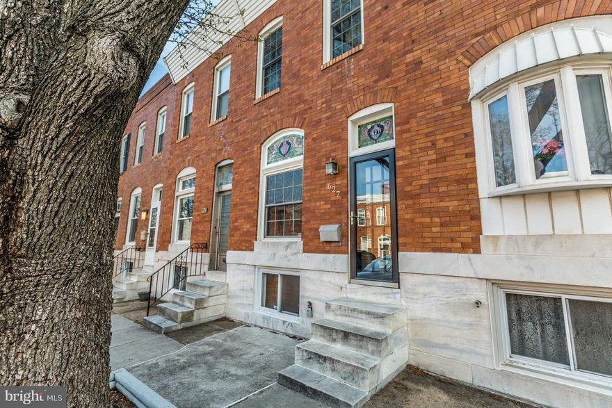 Fall in love w/this updated Canton rowhome, 2 blocks to Patt Park, walk to shops/restaurants features incl; large room sizes, hardwoods,newer carpet, updated kitchen great for entertaining w/island & wine fridge, fenced back patio, fin. LL rec room w/bath, light-filled master w/huge walk-in closet, super bath w/sep tub/shower, rooftop deck, recently recoated roof, diagonal parking in front. WOW!