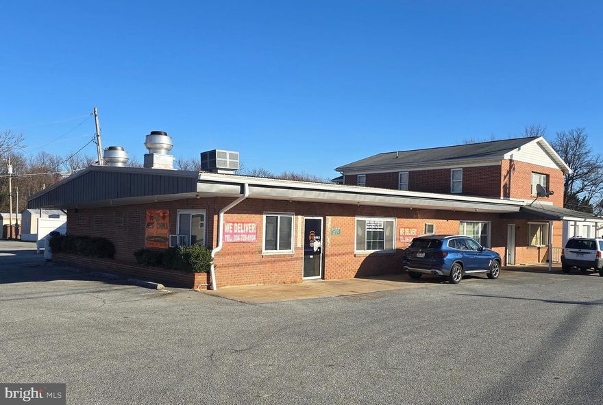 Well maintained property in turn - key condition!  

Restaurant with mobile home park lot rentals.    Leases are month to month. 

The brick building provides a restaurant along with a  2 bedroom and a 3 bedroom apartment with established tenants.  1 mobile conveys with the sale and the other 12 lots are rented lots only.  Potential to add 3 more pads with utilities at the site.   Pending local jurisdiction approval. 

Low maintenance and all utilities are paid by the tenants.  Make an appointment today to view this opportunity to expand your rental portfolio or start one today!!!   

This property is outside of Ranson City limits.