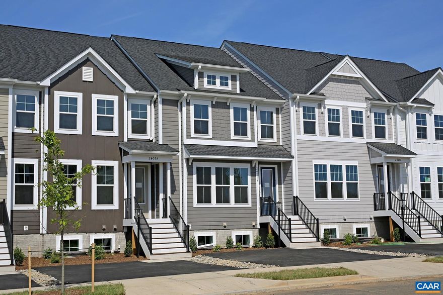 For a limited time, application fees have been waived for this property. Available July 11th - This 3 bedroom Glenbrook townhome is nestled in the quaint Crozet community. Located just west of Charlottesville, Crozet provides easy access to Charlottesville, Staunton, and Waynesboro via I-64. Enjoy proximity to local shops, restaurants, wineries, and breweries.  The 1,815 sqft home backs up to a permanently private wooded setting and boasts LVP flooring, an open living and kitchen area, quartz counters, a waterfall center island, and Frigidaire stainless steel appliances, plus a first-floor half bath, and a separate pocket office space. The top level includes a primary bedroom with a walk-in closet and a private full bath, plus two additional bedrooms that share a hall bath. A full-size washer and dryer are located on the bedroom level. Two driveway parking spaces are included, with additional on-street parking available. Residents can enjoy Glenbrook's playgrounds, fire pit areas, and stunning views of the Blue Ridge.  Up to three pets (100lbs max, combined) are allowed with fees.