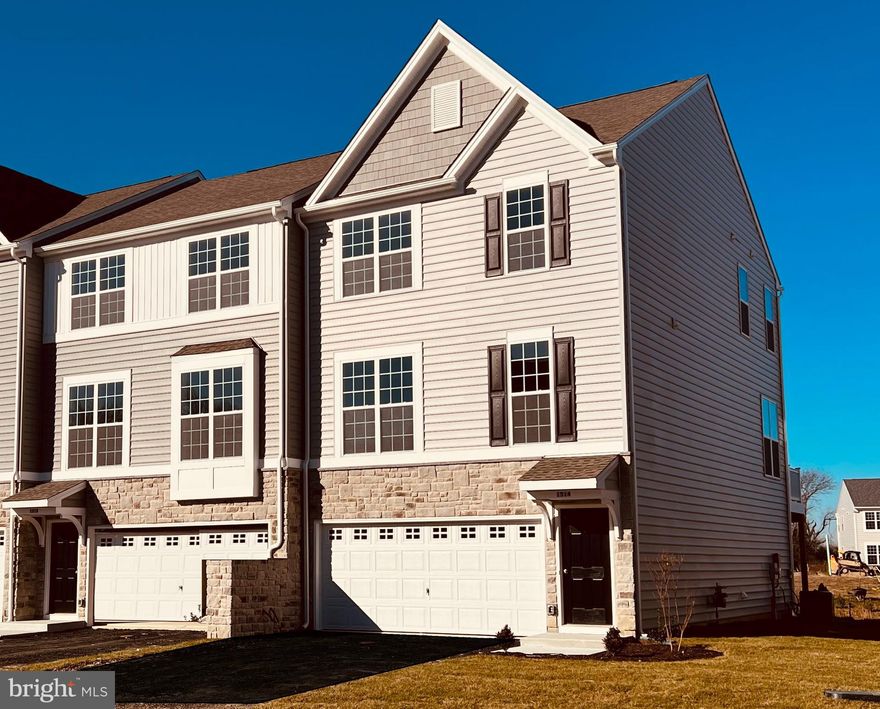 FOUR BEDROOMS. 3.5 BATHS. ENDLESS STYLE!
This beautiful townhome has the space and flexibility you’ve been looking for—4 bedrooms, including a convenient entry-level suite, and 3.5 baths spread across three stylish levels.
The main floor’s open layout is perfect for entertaining! Enjoy 9’ ceilings, wide plank flooring, and a bright great room that flows right out to your private deck—perfect for cookouts, coffee breaks, or relaxing under the stars.
The modern kitchen steals the show with stainless steel appliances, gas cooking, quartz countertops, and an upgraded island with chic pendant lighting—a great spot to gather with friends and family.
Upstairs, your spacious owner’s suite is the perfect retreat, complete with a walk-in closet and private bath. Two additional bedrooms and another full bath make room for everyone.
The versatile lower level adds even more options—use the 4th bedroom and full bath as a guest suite, private bedroom or in-law suite! Sliding glass doors lead right outside, bringing in plenty of natural light.
Located in The Preserve, these townhomes back to open space and are part of the highly sought-after Appoquinimink School District.
Note: This home is under construction. Photos may show similar homes with comparable finishes and exteriors.