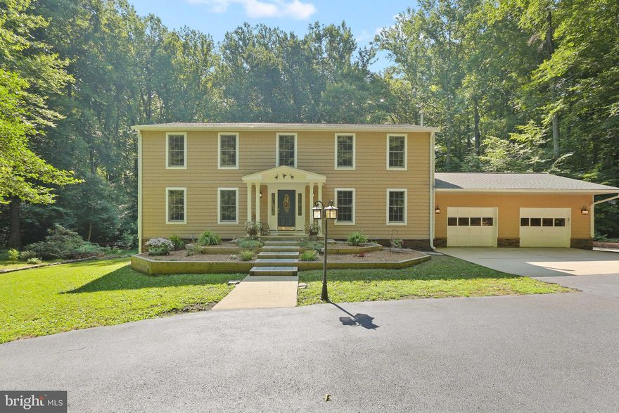 METICULOUSLY MAINTAINED CUSTOM HOME SITTING ON 2+ PRIVATE ACRES IN THE CROFTON SCHOOL DISTRICT NOW AVAILABLE! GLISTENING HAND SCRAPED BEAR TOOTH MOUNTAIN OAK HARDWOODS CASCADE THROUGHOUT. ENJOY CUSTOM CABINETRY, SOAPSTONE COUNTERS WITH SOLID BLACK WALNUT ISLAND, DESIGNER RESTORATION HARDWARE LIGHTING, UPGRADED SS APPLIANCES IN CHEF'S KITCHEN WITH LA CORNUE DUAL FUEL RANGE. 4 BEDROOMS WITH 3 FULL BATHROOMS. SOLID CORE 5 PANEL DOORS WITH BALDWIN HARDWARE. PET FEEDING & WATERING STATION. 2 PROPANE FIREPLACES. MOTION ACTIVATED LIGHTING THROUGHOUT. FULLY CUSTOM GARAGE WITH COMMERCIAL GRADE FLOORING AND BUILT INS - MUST SEE! FOUR SEASON SUNROOM. 3 SEASON COVERED AND SCREEN OUTDOOR LIVING ROOM. LARGE TREX DECK LEADING TO ISOLATED PAVED DOG WALK ENDING IN 1/2 ACRE WOODED DOG RUN.  WHOLE HOME GENERATOR. TONS OF NATURAL LIGHT. PRIVATE OUTDOOR OASIS WHICH INCLUDES BEAUTIFULLY LANDSCAPED YARD. CLOSE PROXIMITY TO RETAIL SHOPPING, LOCAL DINING, AND ALL MAJOR HIGHWAYS. SCHEDULE A PRIVATE TOUR TODAY.