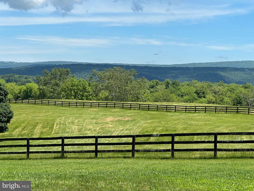 A rare large-acre opportunity in Clarke County, Virginia

369 Quarterhorse Lane, Boyce, Virginia 22620

292 acres of lifestyle potential on pristine equestrian farmland one hour from Washington, DC

Offered at $6,350,000

Attain your hunt country dreams on this prominent land tract, and establish an incredible quality of life: 292 exquisite acres in the heart of Clarke County, Virginia, a pristine setting within the Blue Ridge Hunt territory, nearby Millwood Country Club, and the celebrated Locke Store and Buttery bistro. Imagine yourself on monumental land situated near legacy estates like Lockesly, Carter Hall, The Tuleyries, Mt. Airy, Chapel Hill, Clermont, and others. Design and build your country home, and your country life, to take its place amid these antebellum majesties.

This is a stunning opportunity, a magnificent canvas to design and build your dreamscape and create a manor estate. Just .6 mile from the shores of the Shenandoah River, every crest presents a remarkable viewshed of mountains and valley; stunning, spectacular vistas in all directions, overlooking the seasonal canopy changes of the mountains.

One hour from Washington, DC, in the heart of the most beautiful and protected areas of the Shenandoah and Blue Ridge Mountains Piedmont, this tract includes mostly rolling open fields of three-board fenced paddock and pasture farmland with significant wooded areas. As farmland, the parcels have long been successfully used for equestrian and cattle livestock operations and ancillary crop farming. There are horses and cattle on the farm now. 

This offering has road frontage and main drive on Rt 631 - Clay Hill Road, and 30’ easement access to Rt 723 - Millwood Road, 3 miles off US Rt 50. Existing improvements include a farm manager’s dwelling, a large, enclosed machinery shed, various smaller open run-in structures, an outdoors equestrian exercise surface approximately 120’x200’. 

This offering is an unmatched opportunity for your custom design main country house with additional family compound dwelling sites. Create an exclusive, intentional community retreat on this remarkable land. There are 8 DURs by right, 7 DURs remaining available, suitable for significant manor home residences in a planned compound. 

After home or compound planning, any remaining unused DURs will have a tremendous potential for open space conservation credits from an easement donation. Currently zoned Agriculture Open Space Conservation (AOC), this assemblage of three adjoining parcels has significant easement potential. The entirety is deemed high value for easement credit by virtue of its size, its current zoning, the number and stature of nearby properties already in easement, the desirable location, the prime open farmland, with standing tree cover, adjacent to forest timber, containing perennial streams, and public road frontage. The property is not within an HOA. The road frontage on Clay Hill Road has two private curb cuts. 

This tract is prime for a signature dwelling or dwellings that will become your hunt country legacy.

Washington, DC 54 miles
IAD Dulles, VA 32 miles
Winchester, VA 24 miles
Leesburg, VA 15 miles
Berryville, VA 6 miles
Boyce, VA 4.5 miles
Millwood, VA 2 miles