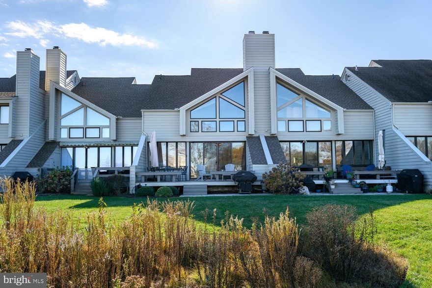 Welcome to this luxurious, waterfront townhouse in the beautiful town of St. Michaels!  This is the absolute total package, offering turn key comfort in a centralized location, allowing you to maximize everything the eastern shore has to offer.  Enjoy the views of the majestic Miles River, boating from your personal, deeded boat slip, or walk across the street to the Eastern Shore's most premier golf course!  This expansive unit offers premium upgraded finishes, a first floor ensuite bedroom, fireplace, and endless enhancements, including new windows and completely new HVAC system.  Minutes to town for shopping or award winning dining experiences.  This is truly the perfect waterfront, low maintenance getaway that is sure to check all of the boxes of a dream home!