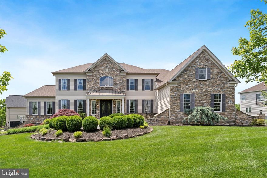 Welcome to this luxurious home! As you enter through the grand double iron doors, you’re greeted by a stunning foyer with a dual staircase leading upstairs. The entire home boasts beautiful hardwood floors throughout. The gourmet kitchen is a chef’s dream, featuring custom cabinetry and exquisite Cambria quartz countertops in the Brittanicca Gold Blue, complemented by a matching backsplash. The kitchen is equipped with a 48-inch range hood with a six-burner cooktop and griddle, double ovens, and a microwave, all by GE Monogram. The home also features window tinting on the first floor for sun protection and custom blinds throughout. The spacious laundry room comes with custom cabinets, quartz countertops, and a utility sink. All floors and garage have central vacuum. The master bath is a true retreat, featuring a rain shower head, marble countertops with quartz, and custom cabinetry. Additionally, the entire house has been freshly painted, offering a crisp, luxurious feel. This home truly has it all! The upgrades are too many to list. It’s one you have to see to believe—every detail is perfection, and there’s absolutely nothing left to do but move in and enjoy.  *All furniture is negotiable and may be purchased separately.