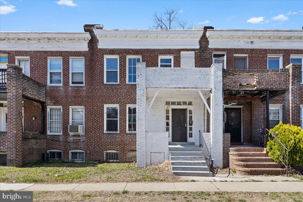 Owner would consider rent to own. Discover the perfect blend of style, space, and convenience in this beautifully designed Townhome, currently constructed as two separate living spaces. The main level features two bedrooms, one bathroom and a kitchen. Private parking in the backyard. Located near Hanlon Park, Coppin State University, Baltimore City Community College, Mondawmin Mall, and Forest Park Golf Course.