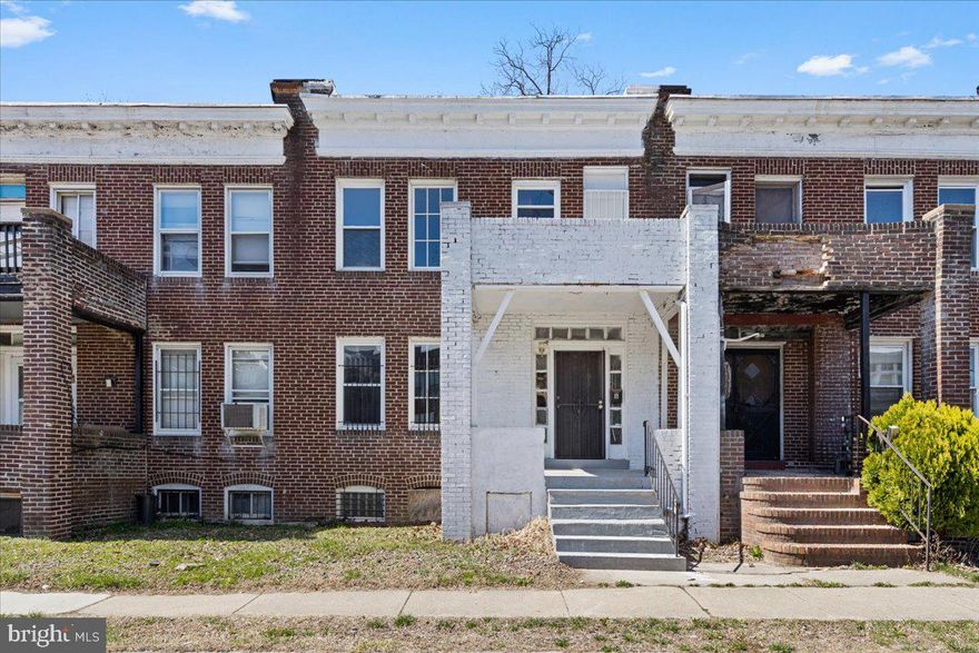 Owner would consider rent to own. Discover the perfect blend of style, space, and convenience in this beautifully designed Townhome, currently constructed as two separate living spaces. The main level features two bedrooms, one bathroom and a kitchen. Private parking in the backyard. Located near Hanlon Park, Coppin State University,  Baltimore City Community College, Mondawmin Mall, and Forest Park Golf Course.