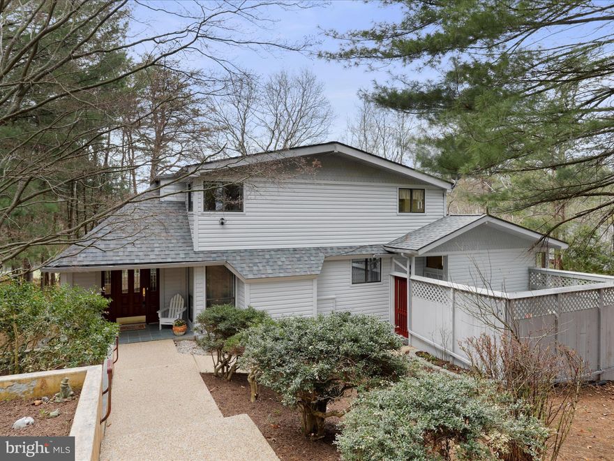 Serene & Stylish Home Overlooking the 11th Green & Sylvan Lake Discover a well-maintained and thoughtfully updated home that offers a peaceful retreat with inviting indoor and outdoor living spaces. Perfectly sited to overlook the 11th green of the Stony Lick Mid-Length Golf Course and capture seasonal views of Sylvan Lake, this property blends natural beauty with modern convenience and comfort.

The home's exterior showcases mature landscaping and a small fenced-in area, ideal for children or pets. Outdoor living is a dream, with a 230 sq. ft. spa deck featuring a hot tub hookup, a cedar-lined screened porch, and a covered slate-floored front porch-each space designed to help you relax, entertain, or simply enjoy the quiet surroundings.

Inside, the home presents a model-like appearance, with a spacious layout that includes a finished lower level offering a rec room with a wet bar, a hobby room, a laundry area, and an ample storage room. The lower level invites endless possibilities-whether you're into crafting, gaming, woodworking, or simply need extra space, bring your hobbies and imagination.

In September 2024, a new architectural shingle roof was installed-complete with a transferable 50-year warranty, offering long-term peace of mind. A paved driveway leads to an oversized two-car garage, while an additional paved circular driveway adds extra parking and curb appeal.

Select furnishings will convey, allowing for a partially furnished, move-in ready experience while giving you the freedom to personalize each space to your taste.

A Full/Golf Class A membership is available with a $3,150 initiation fee, granting access to two golf courses, practice facilities, clubhouse dining, swimming pools, tennis courts, and a fitness center.

With its scenic views, flexible living spaces, and extensive upgrades, this home is an exceptional opportunity for those seeking a refined lifestyle in a serene setting.