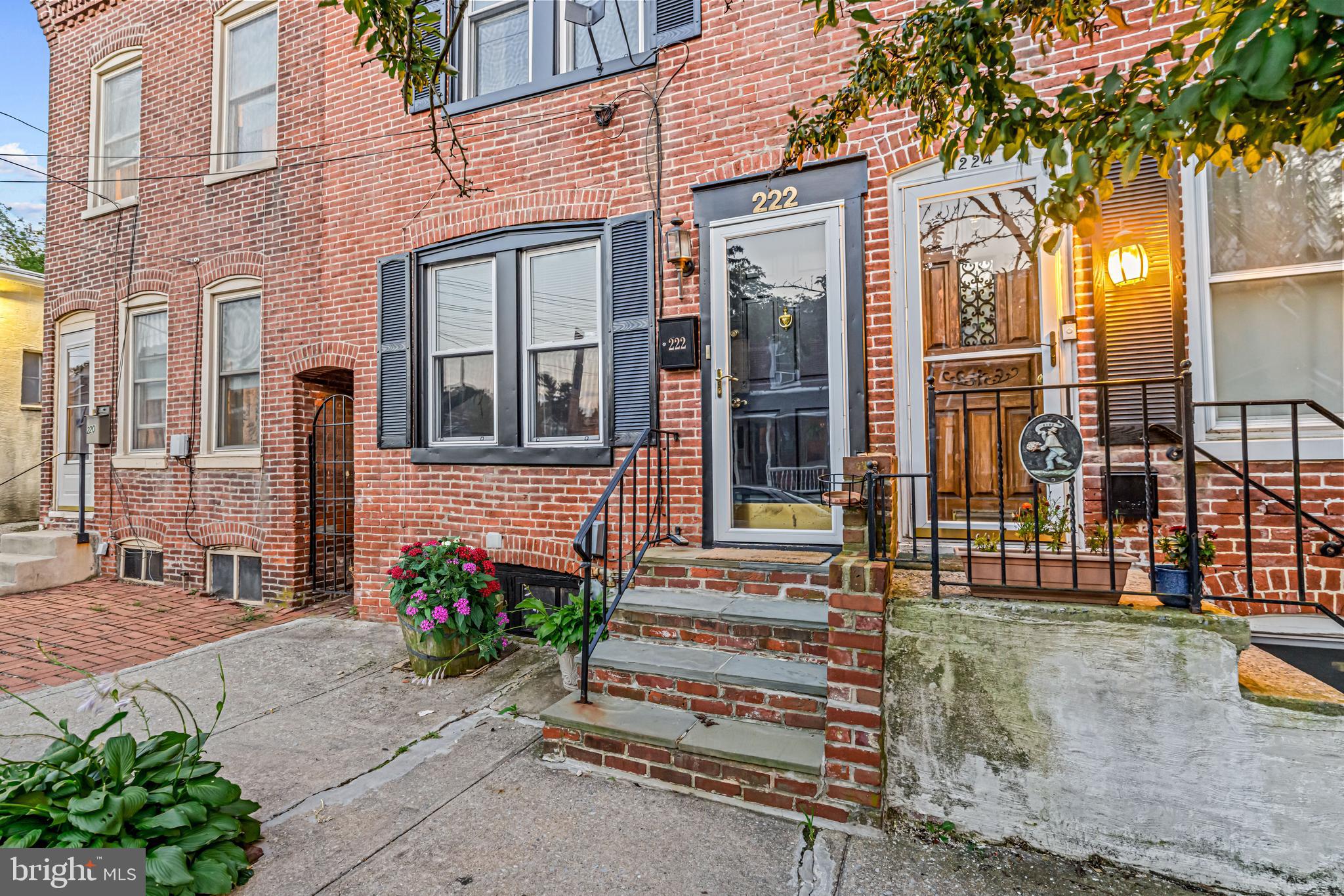 Charming brick row home with fenced rear patio. Walk to all the good stuff West Chester Boro has to offer. Just a couple of blocks from The Grower's Market, West Chester Library and the shops and restaurants on Gay and Market Streets. Lots of hardwoods, quartz countertops, stainless appliances and charm throughout. There's a main floor laundry and mud room with cabinets and a closet for storage. There is a conveniently located full bath on the first floor too. Upstairs has an oversized primary bedroom with a built-in bookshelf, a deep window seat, and two closets. There is a rear bedroom, a walk-in hall closet, and another full bath rounding out the second floor. Low taxes (currently $2285) and gas heat keep the monthly budget in check.