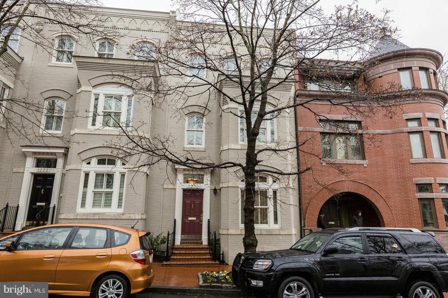 Luxurious, custom 3 Br, 3.5 BA townhome part of Phillips Row reno with TWO CAR PARKING. Gourmet Kitchen with top of the line SS appliances and maple cabinets. Large windows, custom cabinets, hardwood floors and recessed lighting throughout. Beautiful master suite, two large outdoor spaces and large LL with BR 2, family room and wine closet. Patio and upper level balcony.