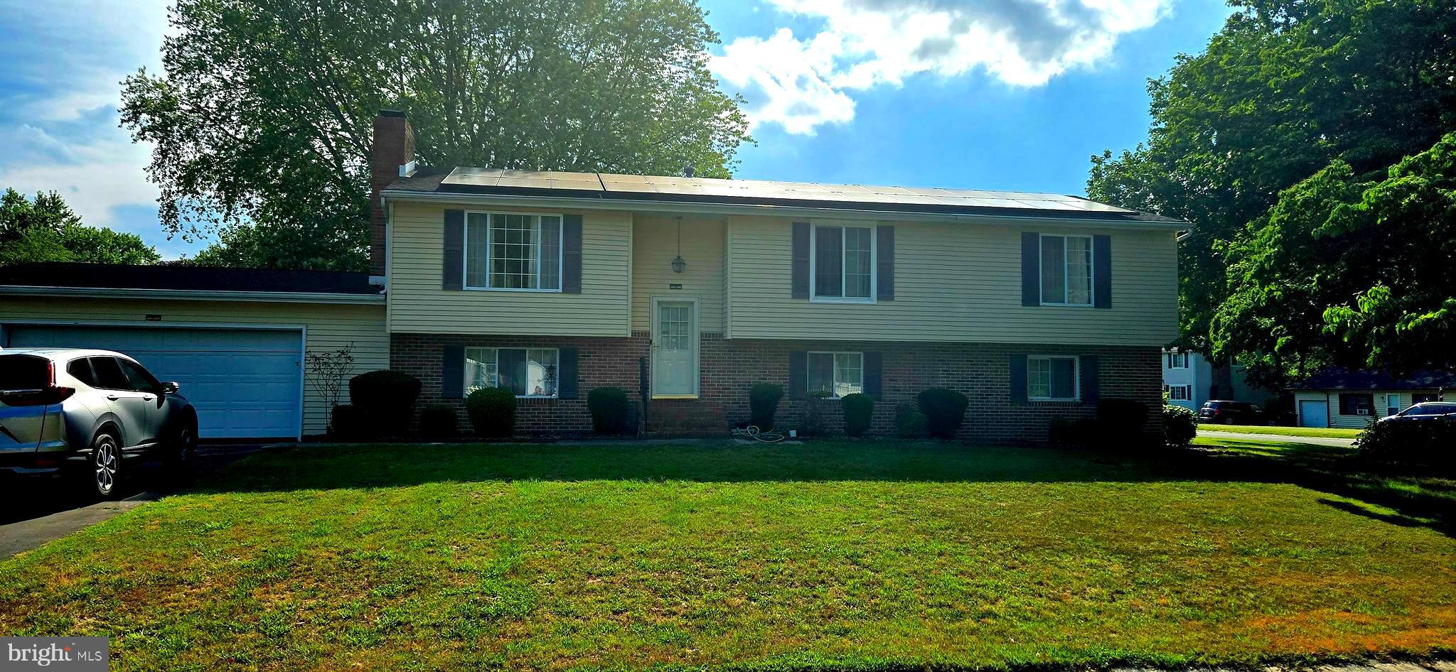 Spacious Split Foyer in Schumaker Glen community. Home features 5 Bedrooms 3 full baths (full bath in garage). Attached 2 car garage that is fully drywalled, with auto garage door opener. Additional full bath and work room in garage. Plenty of parking for additional vehicles. Located in Salisbury, easy access to downtown as well as access to US RT 50. Close to Salisbury Park and Zoo. This home is roomy with large bedrooms, extra thick padding under carpet, family room with fireplace, large office/den with walkout to rear yard. House is sited on nice corner lot with mature shaded trees. Roof replaced 4 years ago with Solar installed. There is No Solar Loan. Solar equipment owned by SUNRUN. Owners have very low Electric costs. Tax Record Square footage does not reflect addition to property. Come see this spacious home!