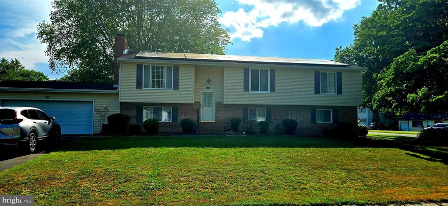 Spacious Split Foyer in Schumaker Glen community. Home features 5 Bedrooms 3 full baths (full bath in garage). Attached 2 car garage that is fully drywalled, with auto garage door opener. Additional  full bath and work room in garage. Plenty of parking for additional vehicles. Located in Salisbury, easy access to downtown as well as access to US RT 50. Close to Salisbury Park and Zoo. This home is roomy with large bedrooms, extra thick padding under carpet, family room with fireplace, large office/den with walkout to rear yard. House is sited on nice corner lot with mature shaded trees. Roof replaced 4 years ago with Solar installed. There is No Solar Loan. Solar equipment owned by SUNRUN. Owners have very low Electric costs. Tax Record Square footage does not reflect addition to property. Come see this spacious home!