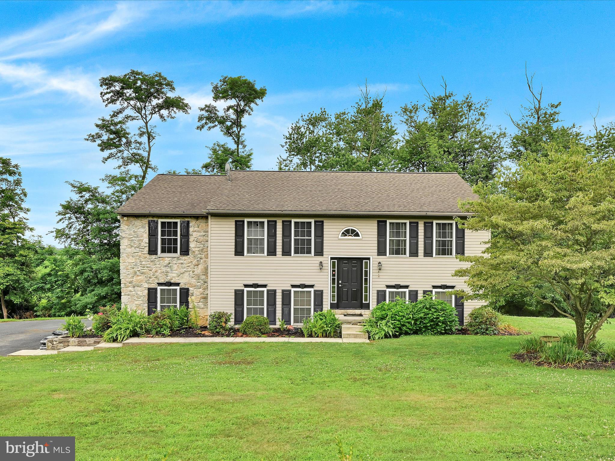 Get ready to fall in love with this beautiful home nestled on a peaceful 1.28-acre lot in scenic Peach Bottom! With 4 spacious bedrooms and 2 full bathrooms, this home offers the perfect blend of comfort and flexibility. The open-concept kitchen features stainless steel appliances, plenty of storage space and a kitchen island that flows seamlessly into the dining area and living room — perfect for entertaining or cozy nights in.
Need more space? The versatile lower level offers a flex room that can serve as a 5th bedroom, home office, or second living room — the choice is yours! Step outside to enjoy your two-tier deck, ideal for summer BBQs, morning coffee, or evening stargazing. The property is surrounded by mature trees and features a charming creek that adds a touch of tranquility to your backyard oasis.
Built in 2003 and thoughtfully maintained, this home is move-in ready and waiting for its next chapter. Don’t miss your chance to own a slice of countryside charm!