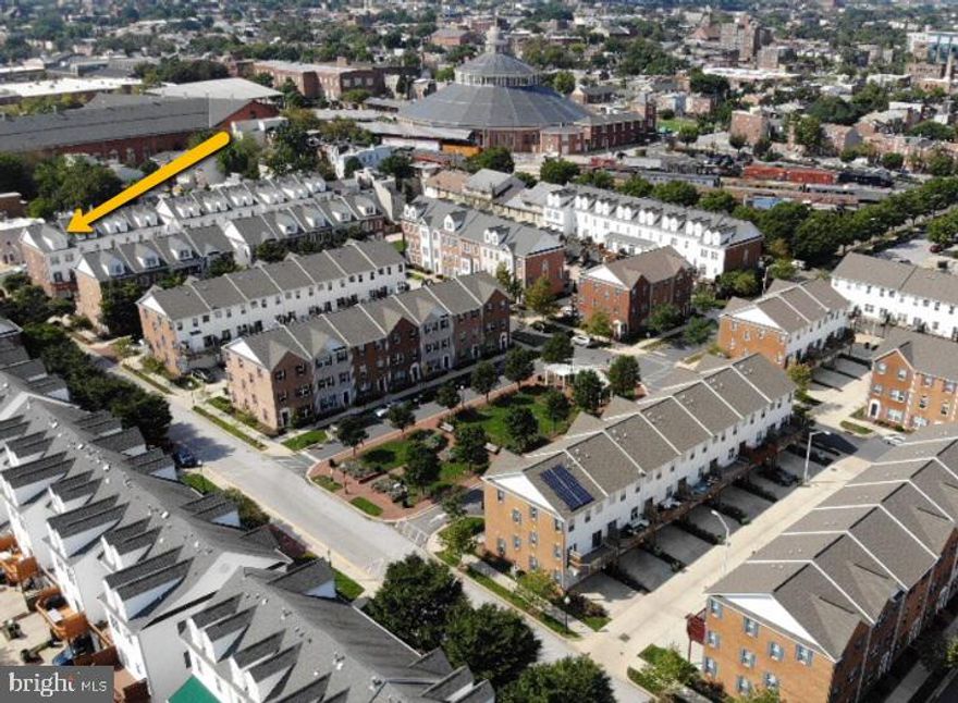 Beautiful 4 Story End Unit Town Home in sought after Camden Crossing Community. This wonderful home boasts 3 Large bedrooms with En-Suite baths and multiple living areas. Enjoy a great island kitchen with plenty of room for dining. Home has a 2 car garage and two additional off street parking spaces behind the house.  Very close to UMAB grad schools, Hospital, Inner harbor, Stadiums and the Casino Entertainment district. 24 hour notice to show.