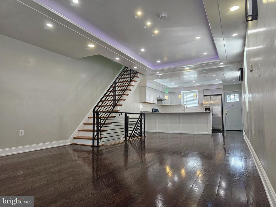 Welcome to 1555 S Hollywood Street. This Corner Home Sweet Home has been totally custom upgraded inside-out with the highest level of craftsmanship and quality. Stunning Beauty 3 Bedrooms & 2 Full Baths Townhouse nestled in the vibrant Grays Ferry neighborhood of Philadelphia, a fantastic neighborhood next to the border of a massive growing development of UPENN & DREXEL & UCITY area. You'll live, filled with comfort and convenience all blended perfectly. Take advantage of super easy access to UPENN & DREXEL & UCITY, It is only about a few minutes from Center City of Philadelphia & Stadium & Live Casino. This remarkable and luxurious home offers 3 beds and 2 baths is truly exceptional. Right after you're passing the beautiful front, you'll see super generous open lay out of the entire home, Straight forward you'll find a massive size of living room. This home is very excellent, super clean and naturally filled with sun light plus tons of recessed lighting throughout, all matched high quality type of flooring material perfectly blended with gorgeous shiny of wood flooring for the entire home. Fully upgraded kitchen complete with full size of breakfast island table, counter top, stainless steel appliances package, beautifully matched back splash also tons of kitchen cabinetry. Smoothly accessible to the fully fenced, private rear yard. Upstairs of this immaculate home offer generous size of master bedroom, as well as the other two bedrooms and a full bath has been totally upgraded. Downstairs level has a full of finished basement could be used as a family room and/or storage area lead to laundry area and a full size of bathroom. All a brand new mechanical system, central HVAC, Roof. This townhouse is located in front of the Lanier Playground, Pet-Friendly Park & Easier to park a car.