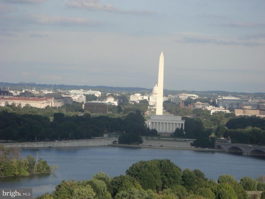 SLEEK & SOPHISTICATED EX.LG ONE BEDROOM (1339 SQ. FT) W/ABSOLUTELY BREATHTAKING VU OF D.C.,MONUMENTS & RIVER. 40 FT LR W/13 FT.CEIL &COMMANDING VIEW THROUGH A FLOOR TO CEILING WALL OF GLASS & DOUBLE BALCONY. UNIT RENOVATED & FURNISHED W/TASTEFUL CONTEMPORARY FURNISHINGS.GREAT ENTERTAINING SPACE. A MUST SEE!LUX.CONDO W/POOL,SECURITY,EX.RM, GROC STORE, 24 HR DESK & GREAT LOCATION-CLOSE TO EVERYTHING