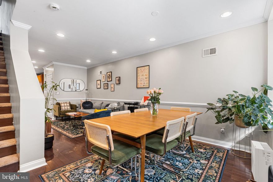 Welcome to this charming 4 bedroom, 2.5 bathroom home, nestled in the desirable Point Breeze neighborhood. This home offers modern comfort, style and convenience, while situated on a quiet street. Step inside and be greeted by the warm and inviting open floor layout, providing space for a dedicated dining area, spacious living room and a kitchen with plenty of storage, stainless steel appliances, tile backsplash and granite countertops. Finishing off the main floor is a conveniently placed powder room and access to the generously sized backyard, perfect to start enjoying the Spring weather.Head upstairs and find two comfortable bedrooms and a full hall bathroom which has both a shower stall and bathtub. Continue up to the third and final floor which provides two sunlit bedrooms or a private, primary suite. This versatile 4th bedroom with built-in shelving, is suitable for a library, office or walk-in closet. The primary bathroom features a luxurious soaking tub and a separate shower stall with Carrera tiles. This home also includes beautiful hardwood floors and recessed lighting throughout, high ceilings and a clean and dry basement for extra storage. Fantastic location away from the bustle of the city but close enough to walk to Graduate Hospital, Rittenhouse Square and all the wonderful places Washington Ave. has to offer.