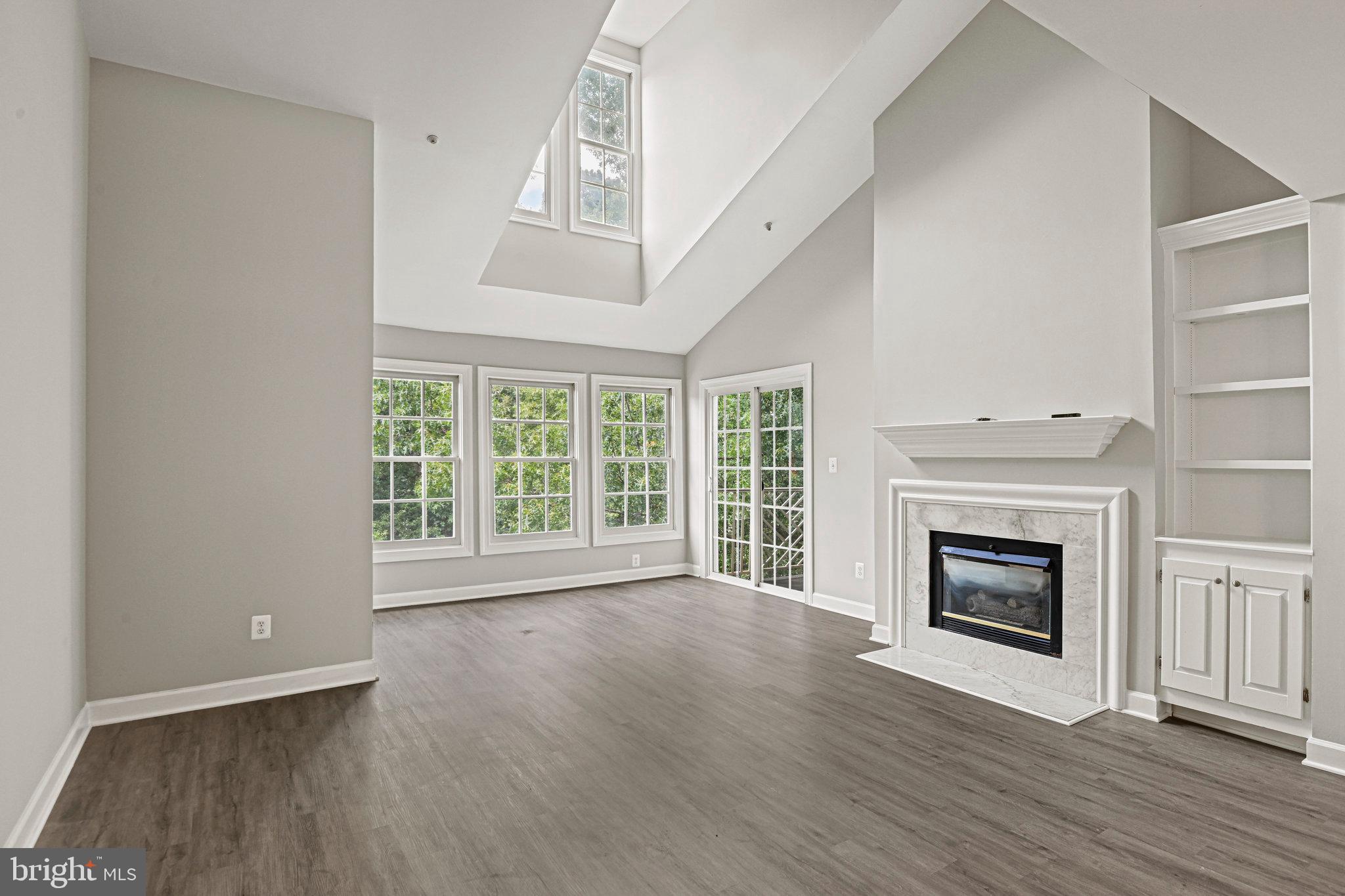 Rarely available penthouse loft unit with a water view is located in the heart of Fair Lakes —just minutes from everything you need and more. Offering a perfect blend of comfort, convenience, and charm, this residence is ideal for those seeking stress-free living in a vibrant, well-connected neighborhood. Step inside to discover a spacious, open-concept layout with ample natural light, vaulted ceilings, a cozy gas fireplace, and direct access to your private deck. The kitchen features modern appliances, plenty of cabinet space, and an adjoining dining area perfect for hosting or casual meals. Community amenities include beautifully landscaped grounds with walking trails, a scenic pond with a fountain, tennis courts, and ample guest parking. The community is pet-friendly and known for its peaceful setting and well-kept surroundings.
Unbeatable location: Less than 1 mile to Fair Oaks Mall, Fair Lakes Shopping Center, Whole Foods, and Wegmans, Easy access to Route 66, Route 50, Fairfax County Parkway, and I-495, Minutes to the Vienna/Fairfax-GMU Metro Station and multiple bus lines, Close to top-rated schools, George Mason University, and Inova Fair Oaks Hospital, Whether you're commuting, running errands, or enjoying the area's many parks and restaurants, everything you need is right outside your door. Don’t miss this rare chance to own in one of Fairfax’s most convenient and desirable communities. The perfect place to call home, for making memories that will last a lifetime!