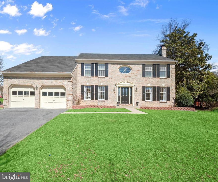 Welcome to 9524 Michaels Way in Ellicott City MD. This beautifully maintained Grayson Kensington former model home in the sought-after Valley Mede community offers the perfect blend of interior and exterior living spaces. Outside, a stately brick front and classic black shutters provide timeless elegance and stunning curb appeal.  The front and sides are fringed with raised paver garden beds just waiting to bloom and a secondary side entry offers convenient access into the mudroom and laundry center. A glorious cherry blossom tree and mature magnolia tree frame the front elevation, while an expansive tiered deck and privacy trellis provide outdoor living and dining options.

Step inside to a gracious foyer sided by living and dining formals offering pristine hardwood floors and crown molding.  The formal dining room opens to the kitchen while the formal living room opens to the study in a thoughtful floor plan for living and entertaining flow. The living room features a fireplace and built-ins that flank a pair of French doors that transition to the study with library shelving and a second pair of French doors that transition into the adjacent Family Room.

Layered light streams into the family room through several sources including a pair of skylights in the vaulted ceiling, a pair of tall windows with arched transoms that flank the brick fireplace, and an atrium door with integral blinds that leads to the rear deck and lawn. A bay window defines the central breakfast room that transitions seamlessly from the family room to the kitchen, mudroom and laundry. Light cabinets, sparkling contrast granite countertops and stainless steel appliances wrap the kitchen and peninsula highlighting a central window over the sink.

Glistening hardwood stairs wind upward gracefully to the spacious upper level landing overlook where a pair of French doors and a Palladian window invite sun-filled respite in the primary bedroom suite. A separate sitting room and oversized bedroom area are sided by two walk-in closets and a spa-like bath. Three additional bedrooms circle the open stair and complete the upper level.

Downstairs, a fully finished lower level offers a full bath and new carpet that stand at the ready for comfortable living and casual entertaining. Don't miss this opportunity to come home to a very special property in a vibrant community with great schools and easy access to shopping, dining and entertainment!