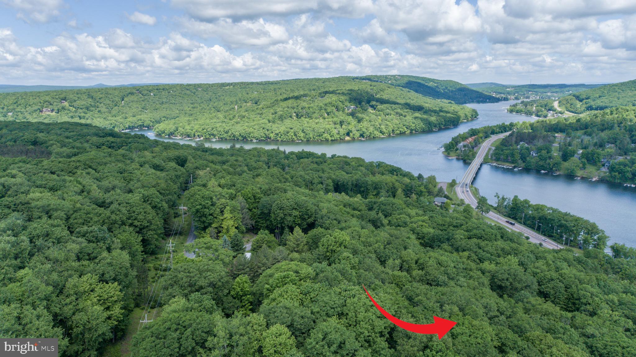 Don't miss the opportunity to own a lake area lot near the one and only Deep Creek Lake.
0.34 acre wooded lot, close to multiple local attractions. Call today! Verify utilities with Garrett County Environmental Department. Being sold subject to successful perc.