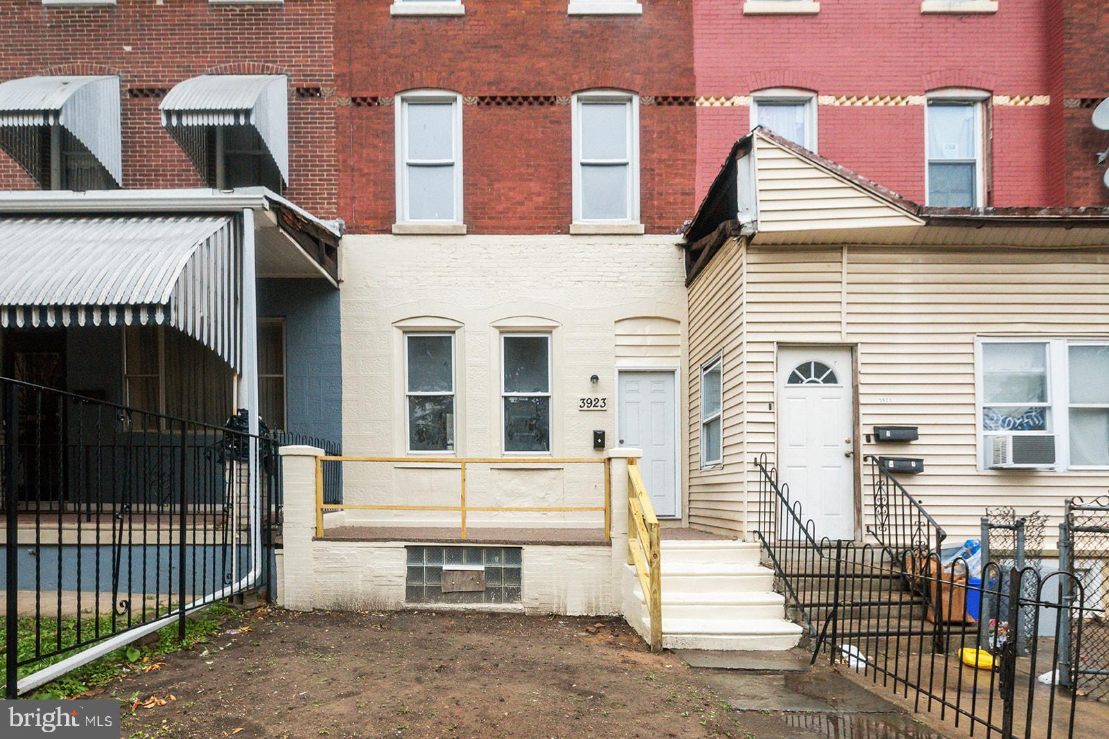 Calling all investors and owner occupants! Welcome to 3923 Brown St, a spacious 5-bedroom home in the heart of Mantua!
This charming 3-story townhouse offers 5 bedrooms and 1 full bathroom across 1,864 square feet of living space. Built in 1915, this home combines classic architectural details with modern comforts.
As you approach, you're greeted by a traditional façade and a welcoming front porch, perfect for relaxing evenings. Step inside to discover an open floor plan featuring a flow-through living and dining area, ideal for entertaining or family gatherings. The well-maintained kitchen is equipped with a range hood, refrigerator, and wooden cabinetry, ready to inspire your culinary creations.
The spacious master bedroom boasts a custom closet, providing ample storage space. The minimalist bathroom is designed with white tiles from wall to floor and includes a bathtub, shower, and cabinet sink. Well-maintained wood-like flooring runs throughout the first floor, adding warmth and character to the home.
Outside, the backyard offers plenty of space for gatherings and outdoor entertaining. Located in the bustling Mantua neighborhood, you'll enjoy proximity to local shops, dining, and public transportation options, making city living convenient and accessible.
Don't miss the opportunity to own this exceptional property—schedule your showing today!