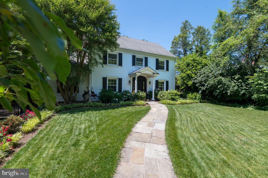 Prime location! Ultimate urban living in the heart of the Little City. Convenience and walkability.  No car needed! Walk Score 90,  A must see 1936 expanded, classic center-hall colonial situated on a landscaped 18,000 sf fenced lot and extensively renovated in 2017. This elegant home features 4/5 BR and 3.5 BA, over 4,200 finished square feet on 4 levels. New Chef’s kitchen with white cabinets and quartz countertops overlooks a perfect fenced yard surrounded by mature trees. Walk in pantry + butler's pantry, sep dining room with French doors that open to a paved secluded patio with a natural gas grill station (never change a propane tank again!). Off the family room is a great deck--perfect for entertaining. Master suite with his and hers walk-in closets, large free-standing soaking tub & curbless, frameless shower. All updated bathrooms with modern finishes and fixtures, a laundry room and a walk-in linen closet, attic for a 5th bedroom or another workspace.  TV room and a fully equipped gym (included) in the basement.  A generous garden shed with electricity in the back yard can be easily converted to an independent office. Resurfaced driveway with an automatic gate, newly refinished beautiful hardwood floors throughout, new windows, 2 FPs (wood and ventless gas), architectural details and much more. No expenses or details were spared in creating this perfect urban home.  Privacy and space, meticulously maintained property.