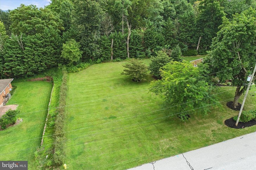 You will be intoxicated with the scenic views this .29 acre building has to offer, in York Township, Dallastown Schools. Imagine the seasons changing from your new front porch!  Country quiet, yet minutes to conveniences. The lot is located in a wonderful community of fine homes, towering trees, and friendly neighbors. Take an evening stroll to PerryDell Farms and Dairy, for ice cream or one of their other yummy treats.  Quick access to I83 Leaders Heights Exit, York Hospital, Apple Hill, and much more. You are also minutes to several county parks. It truly is the perfect spot for your dream home. Bring your own builder and plans. Don't have one, we work with several excellent builders and are happy to assist with your search/needs. Take advantage of a unique opportunity!  All Public Utilities Available including Sewer and Water.  No Mobiles or Double-Wides permitted.  AGENTS - Please read Agent Remarks!