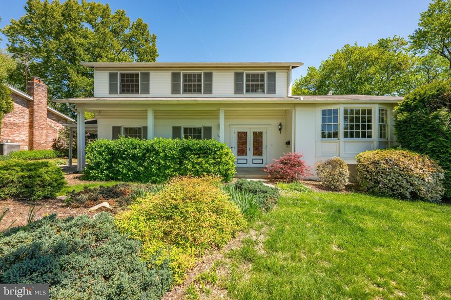 One of the largest models in the neighborhood, this beautifully maintained 4-bedroom, 3 full bath home offers a flexible layout with potential for a 5th bedroom on the main level. A welcoming front veranda leads into a spacious main level featuring a den/office, gracious living and dining rooms, and a comfortable family room with fireplace. The large eat-in kitchen is thoughtfully designed with tons of cabinet space, a breakfast area with side-board storage and open shelving, and new dishwasher. A convenient laundry/mudroom sits just off the kitchen with direct access from the carport. A screened porch overlooks mature landscaping, including flowering beds, mature trees, and a large grassy yard ideal for outdoor enjoyment. The yard is fully fenced and includes a storage shed. Upstairs, the primary suite features an en-suite bath, along with three additional bedrooms and a recently renovated full hall bath. Hardwood floors run throughout most of the main and upper levels. The lower level offers flexible space with a separate side entrance and large utility room great for extra storage.  Recent improvements include an updated upper-level hall bath, new washer and dishwasher, 200-amp electrical heavy-up, and a new backyard fence. Ideally located within walking distance of Beverly Farms Elementary, Herbert Hoover Middle School, and Winston Churchill High School, and just moments from both the Regency Estates and Potomac Woods Swim Clubs. With easy access to I-270 and I-495 and close proximity to Park Potomac and Cabin John Village for shopping and dining, this home offers both comfort and convenience. Please note: Square footage is estimated and calculated by an independent third party; information is deemed accurate but not guaranteed.