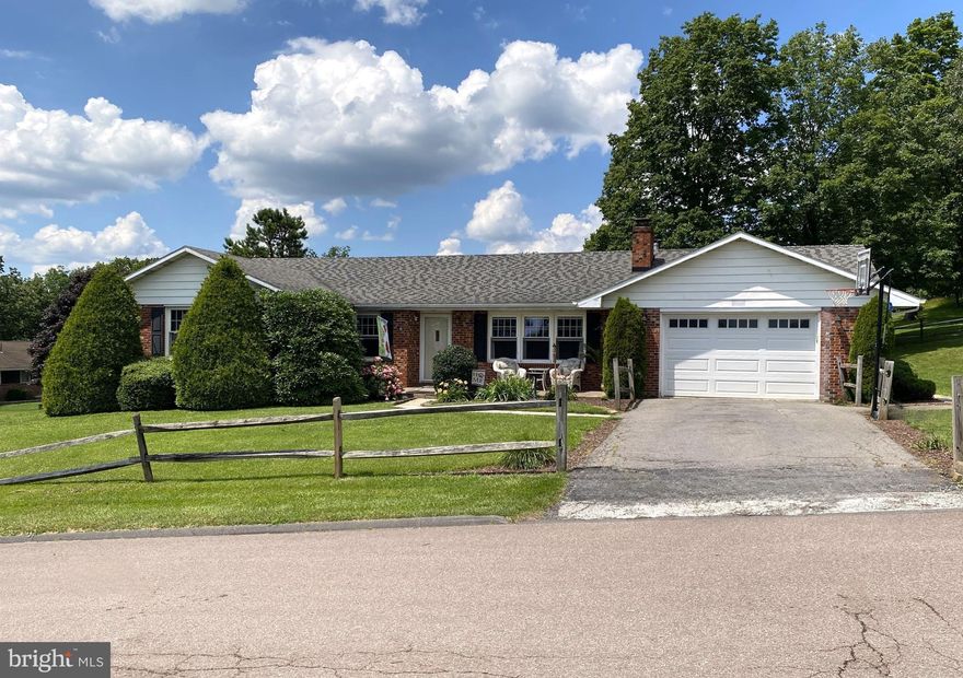 Discover the ideal one-floor living opportunity with this charming three-bedroom, one-bathroom home nestled on a desirable corner lot. Cozy up next to the wood-burning fireplace in the living room or indulge in the delightful aroma of freshly baked cookies from the well-appointed kitchen. Hosting gatherings is a breeze in the spacious, open-concept dining area, seamlessly connected to the kitchen. The bathroom has been tastefully updated with luxurious touches, while the primary bedroom offers an oversized space with a comfortable sitting area. Practical amenities include a crawl space foundation, attached garage, and convenient first-floor laundry for ease of living. Step outside to enjoy a lush, private yard, complemented by a maintenance-free brick exterior. Relax on the front patio on quiet evenings, or take in the tranquility of the surroundings. If this lovely home checks all your boxes, don’t wait—Call Us Today to schedule a tour! The scenic mountains of Western Maryland are calling, and your new home awaits.