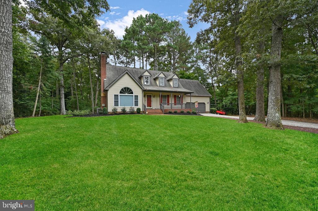 Nestled in the highly sought-after Fox Chase community, this captivating home awaits its new owners. With inspections complete, the home is ready for immediate occupancy. Nestled on an expansive acre of land, set back from the road, and lined with trees that create an oasis of privacy.
Step inside and be greeted by 2,650 square feet of living space, designed for comfort and elegance. The family room boasts cathedral ceilings and a cozy pellet stove with a custom mantel. Adjoining the family room is a dining area, while on the opposite side of the kitchen, a quaint breakfast nook awaits. The kitchen itself has an island, granite countertops, and warm lighting beneath the cabinets.
The main level also hosts the master suite, as it features a stunning open shower concept with gorgeous tile work, a double sink vanity, and ceramic tile floors, creating a spa-like ambiance.
Ascend the stairs, accessible from two different points, and find yourself in a beautiful loft area with built-in cabinets. This level also accommodates two additional bedrooms, a full bathroom with a double vanity sink, and a large bonus room that can be accessed from either staircase.
If you choose to use the staircase that leads directly from the garage, you will find yourself conveniently situated in the bonus room, providing an additional versatile space for your needs.