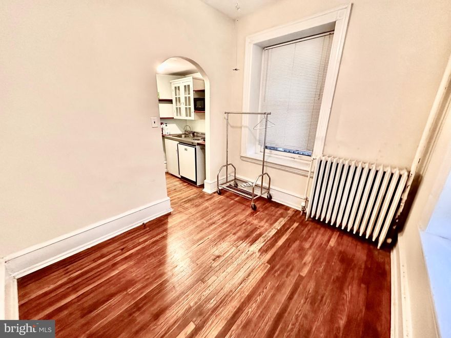 This apartment is a perfect fit for the minimalist who requires little storage and hotel room amenities. The efficiency living space is a mere 8ft x 10ft plus a small closet. The kitchen has an electric 2 burner stove, mini fridge and microwave. The bathroom has an ample tiled shower stall. The perfect apartment for someone who just needs a space to rest their bones. Washer and dryer just outside the door. Cats welcome. Tenants pay electric. First, last and one month security due at lease signing. Credit over 650 and verifiable income required.