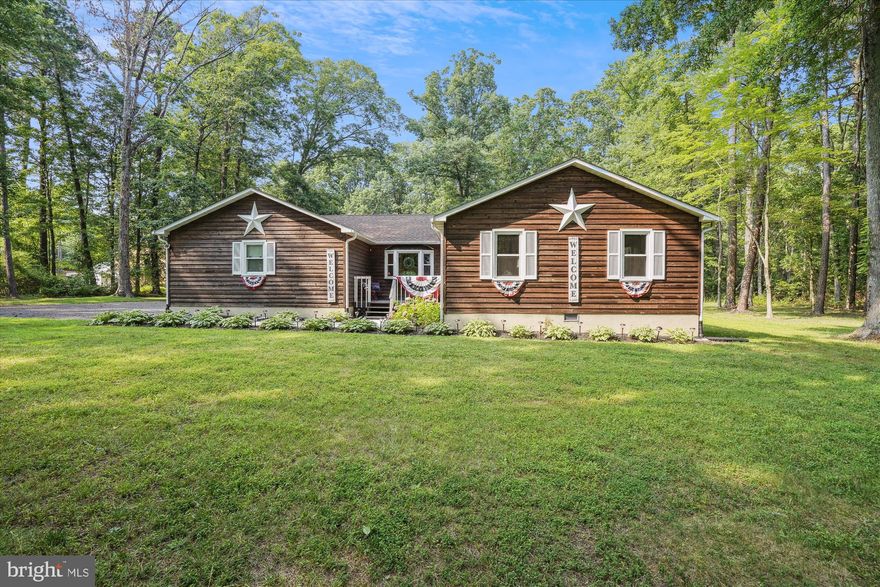 Welcome to this exquisite home nestled in the Romancoke on the Bay community offering water access and a boat launch for canoes & kayaks. Located on 1.03 areas and surrounded by an abundance of nature's wildlife. The home has a private country feel and has been meticulously maintained showing  so much pride of ownership. Featuring a newer roof, driveway, washer/dryer, pellet stove, renovated baths, hi-tech thermostat and a freshly stained exterior, Crawl space is encapsulated with a dehumidifier. Close by amenities include Romancoke Pier, Shipping Creek boat ramp, Blue Heron Golf Course and more. Come See!