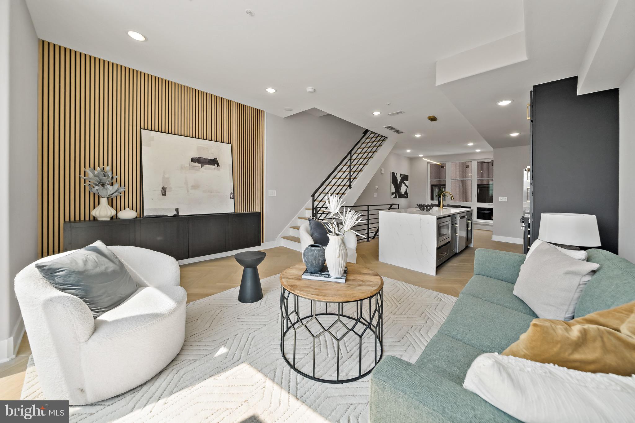 Welcome to Moyamensing Square, an exciting new construction planned community with 24 chic residences in the heart of Pennsport! These units are bi-level with an open floor plan. This upper unit that gets lots of natural sunlight with large front windows. Features include wide-plank hardwood floors, custom Kitchen cabinets, quartz countertops, and recess lighting, and great views. Main floor has living, room , dinning room, and kitchen. Second floor has two bedrooms and two customers baths Primary has stall shower with dual rain heads. This unit also has huge roof deck with amazing views Builder is offering one year home warranty and tax abatement. This a very walkabout neighbor hood that has Dickinson Square park just one block away and Hermanns coffee. There are plenty of restaurants and shopping near by including Target and Ikea . Pennsport is one of the most storied Philadelphia neighborhoods around with its vibrant dining, boutiques, and shops are the best of the modern world. New Construction. Square footage total includes above grade space and below grade space and is estimated. Taxes and square footage to be verified by the buyer. Renderings are for marketing purposes only.