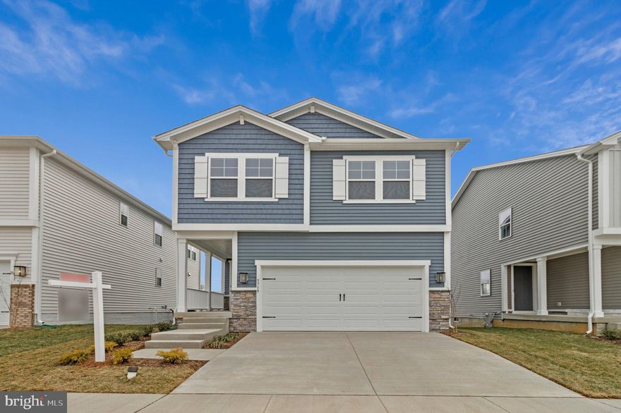 WITH RATES BELOW 5% YOU CAN OWN THIS BRAND-NEW MOVE IN READY HOME FOR THE SAME PRINCIPAL & INTEREST PAYMENT AS A $545,000 RESALE! This 4-bedroom, 3 1/2 bath Lynette by Richmond American Homes. The main floor of this charming Lynette plan offers an inviting great room with an electric fireplace with mantel boasting a stunning floor to ceiling tile, Mohawk luxury vinyl plank floors on the main level, 9' ceilings with 8' doors, a powder room, and a gourmet kitchen with a convenient island, quartz countertops, backsplash, pantry with wood shelves.  Beautiful Oak Stairs take you to the top floor, you’ll find four elegant bedrooms, including an impressive primary suite showcasing a roomy walk-in closet and a deluxe bath with double sinks. A secondary bath, top floor laundry room, 2-garage with EV charging station, video doorbell, smart locks, smart thermostat for energy efficiency, nice wide sidewalks throughout the community, and last but not least a completely finished basement with 9' ceilings, rough-in for wet bar & a full bathroom complete this home. Enclave at Arundel Hills is an exciting new community in Glen Burnie. It offers easy access to major employers in Baltimore, Annapolis, and Washington D.C. via I-695 and I-97 and is located just minutes from Fort Meade. Residents can also appreciate close proximity to BWI, countless dining options and minutes to waterfront restaurants, and entertainment options. Choose from an attractive array of single-family homes, each boasting the designer details and in-demand features today’s homebuyers are seeking! Model is OPEN but visitors are encouraged to call ahead to be guaranteed a dedicated appointment.