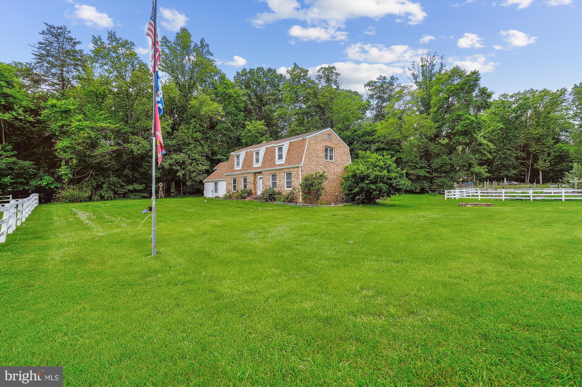 Gorgeous Farm Oasis in Stafford! Welcome to your dream retreat on over 5 fully fenced acres! This charming Dutch-style home offers a perfect blend of comfort, space, and country living. A brand-new roof was just installed one month ago, and gleaming hardwood floors flow throughout the main level.
Step into the gourmet kitchen featuring stainless steel appliances, a brand-new oven, and a stylish new backsplash. Enjoy casual meals in the eat-in kitchen or gather in the formal dining room, complete with a cozy wood-burning fireplace and access to the fully screened rear patio—ideal for entertaining with multiple fans, outlets, and serene views.
The main level also includes a large sunken family room, a separate living room, a spacious bedroom, and a bonus room with access to the screened porch. Two full bathrooms complete this level.
Upstairs, you'll find a primary suite with a walk-in closet and ensuite bath, plus two additional bedrooms that share a hallway bathroom. A spacious rear rec room offers endless potential and includes a separate exit with brand-new stairs.
Outside, the property shines with a 2-stall barn and workshop, two sheds, raised flower beds, and a covered area for RV or boat parking. Located just 9 miles from Quantico, this private oasis offers both tranquility and convenience.
Don't miss the opportunity to make this beautiful Stafford property your own!