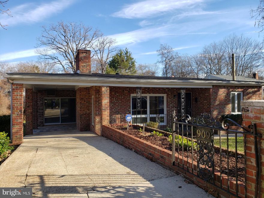 You will want this home for your own as soon as you step through the gates. Covered carport with inlaid concrete welcome area.  Exterior storage/sunroom/swingroom.Open floor plan. Kitchen of your dreams. Matching stainless,over sized fridge, micro wave. Look at that Island so big it should be named. And WHAT? that slab is to die for. Plenty of extra storage in the island. A closet that could be a pantry or coat closet. New white cabinetry. Lots of counter space for kitchen prep. Convection oven, five burner gas range with griddle option,what could you cook with that?Lots of options with the open floor plan living space. Decorative fireplace.2 of bedrooms have picture windows for natural light all winter long to chase those winter blues away.