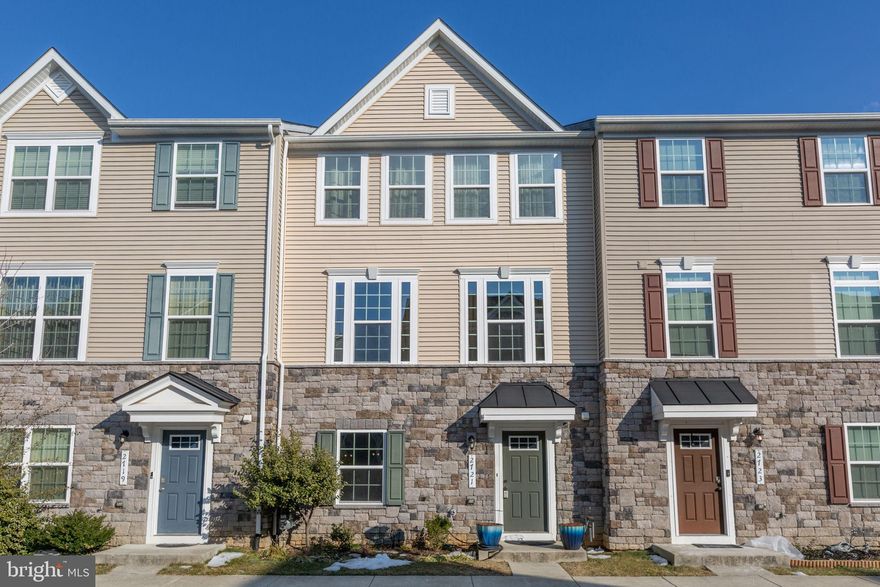 LOCATION! Welcome to 2721 Wheatland Station Way — a well-maintained three-level townhome ideally located in Spotsylvania County. The commuter rail station is less than a mile away, with shopping and dining just minutes from your door and historic downtown Fredericksburg only 10 minutes away.

Step inside to a versatile entry-level space perfect for a home office, workout area, or additional living space. The second level features a stunning kitchen with a huge island, ideal for meal prep and casual gatherings. The kitchen, dining, and family room flow seamlessly together, creating the perfect setting for entertaining.

Upstairs, you’ll find two spacious secondary bedrooms and an oversized primary suite. A full hallway bath and separate laundry room add everyday convenience. The primary bedroom is your private retreat, complete with a walk-in closet and an impressive en-suite bath.

You’ll love the neighborhood and unbeatable location of this beautiful townhome. Schedule your showing today — this one won’t last long! And believe it or not, summer is right around the corner… just in time to enjoy the community pool!