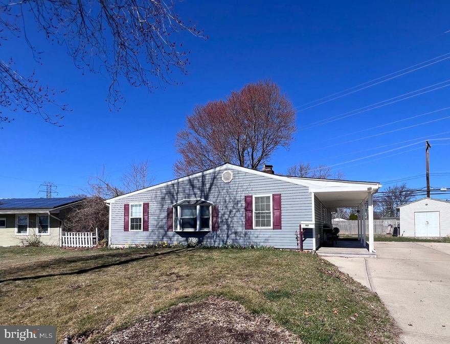 Don't miss this adorable completely remodeled & expanded Levittowner with 4 spacious bedrooms & 2 full baths. Stunning upgraded eat-in kitchen with white cabinetry, chic tile backsplash, granite countertops, double sinks, stainless fixtures, pot filler, stainless appliances, recessed lighting & soft close drawers. Attractive great room with custom moldings, recessed lighting, built-in storage cabinet & gorgeous gray shades of stylish LVP.  Hall bath with elegant gray toned tub surround including sink with white cabinetry & white tub.  In addition there are 4 spacious bedrooms one being the primary with its own beautiful upgraded bath all in todays desired tones of grays & whites. This bath also offers a large walk-in shower with beautiful gray tiles, custom moldings, white vanity with double sinks &  stainless fixtures throughout. There is a dedicated laundry area.  The front porch offers outdoor convenience rain or shine. The huge rear yard is fenced-in which offers security for young children & pets.  Upgrades include: Central air/ heat pump new 2022. Roof new in 2021. Water Heater new in  2022.   New sewer line 2024. New Refrigerator 2022.  New washer/dryer in 2024. All  LED recessed lighting throughout.. Don't miss this one, it is trueyl move in ready!!