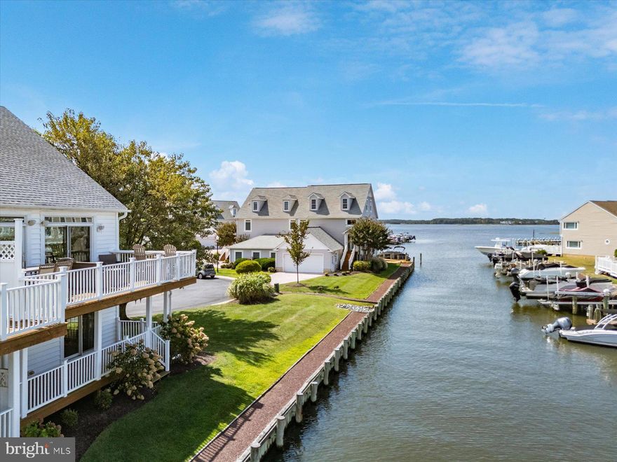 Stone Harbor is a prestigious gated bay waterfront enclave in North Ocean City—truly one of a kind. Privately situated within the community, this exceptional residence offers a serene setting with expansive waterfront green space surrounding the home and a short, scenic stroll to the community pool and private pier designated Deeded Boat Slip #12. Mature trees and classic street lighting enhance the refined coastal atmosphere. This elegant fully furnished 4-bedroom, 3.5-bath home is thoughtfully designed to maximize water views and effortless living. The first level features a waterfront primary suite with private deck, walk-in closet, and spa-inspired en-suite bath, along with two additional waterfront guest bedrooms offering stunning views and a beautifully appointed guest bath. A spacious, well-placed laundry room completes the level. The main living level is an entertainer’s dream, showcasing a dramatic wall of windows framing breathtaking westerly sunset views. The open layout includes a sophisticated living room with gas fireplace, dining area, and a newly remodeled gourmet kitchen with an oversized island, complemented by a flexible office or lounge space. Step outside to the expansive waterfront deck—perfect for refined outdoor entertaining and sunset gatherings. The third level offers a generous private primary suite with a half bath, providing versatile accommodations ideal for hosting family and guests.Residents of Stone Harbor enjoy exclusive amenities including a waterfront pool, private boat ramp, and community pier with deeded boat slip featuring electric and water—delivering a true luxury waterfront lifestyle in one of North Ocean City’s most coveted gated communities.
Open House Valentine's Day 10;00-2:00