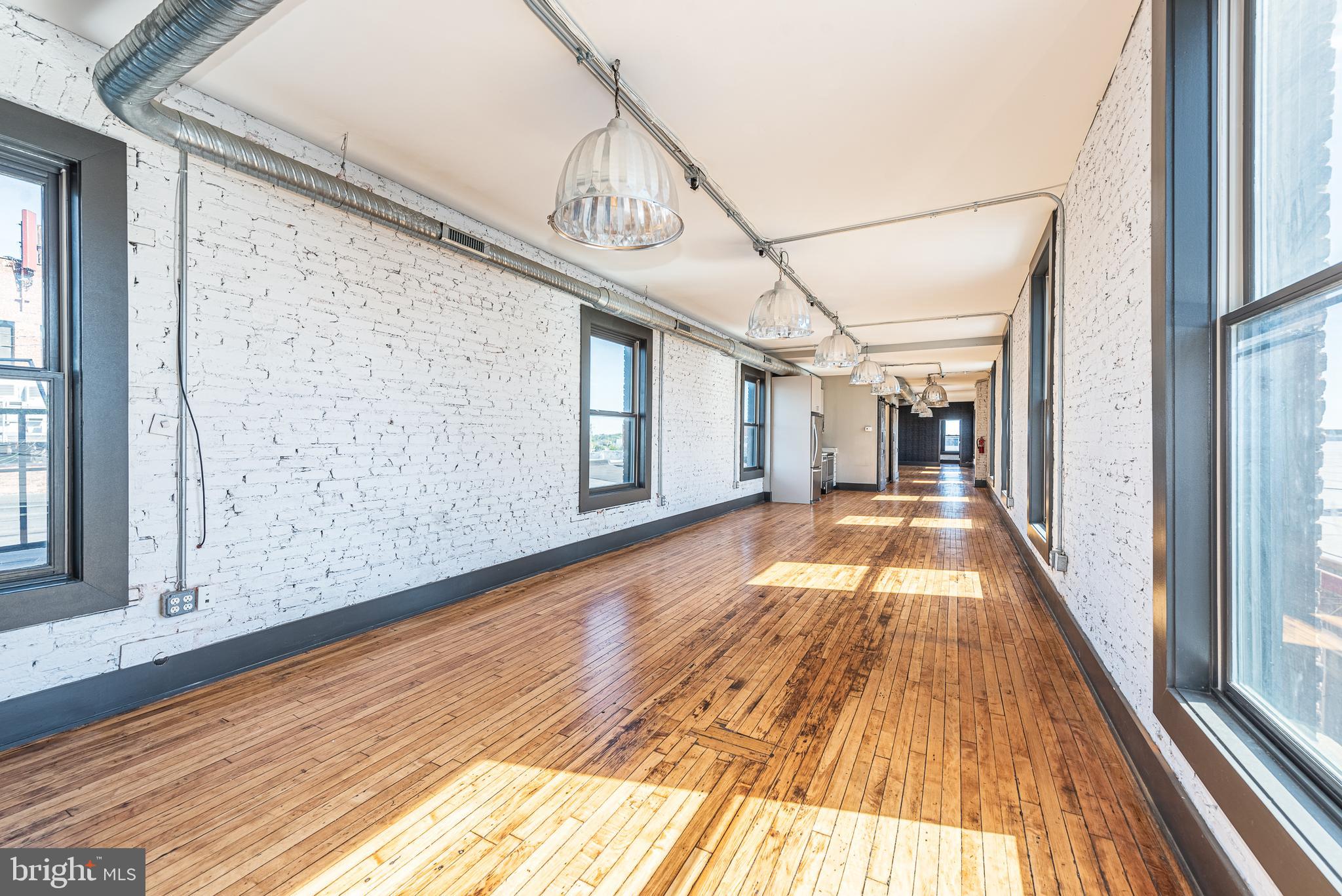 CONTEMPORARY COMMERCIAL SPACE IN PRIME CANTON LOCATION! Triple net lease. Approximately 1400 sq. ft. of commercial space w/ hardwood floors, exposed ductwork, tall ceilings, exposed brick, full kitchen w/ granite counters & ss appliances, & full bath. Located on highly traveled Conkling St. w/ good foot traffic. Ready for immediate occupancy. Triple Net Lease